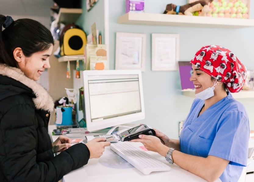 Client Paying at Clinic (2)