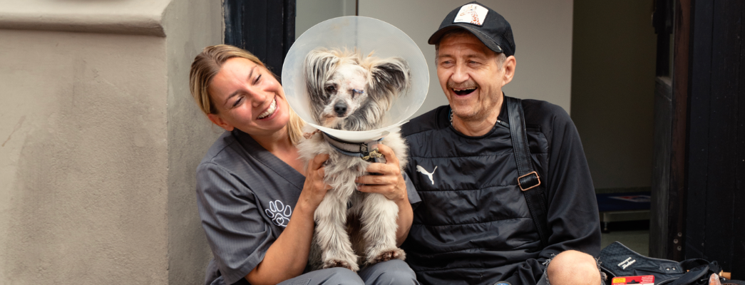 veterinarian-with-dog-and-owner